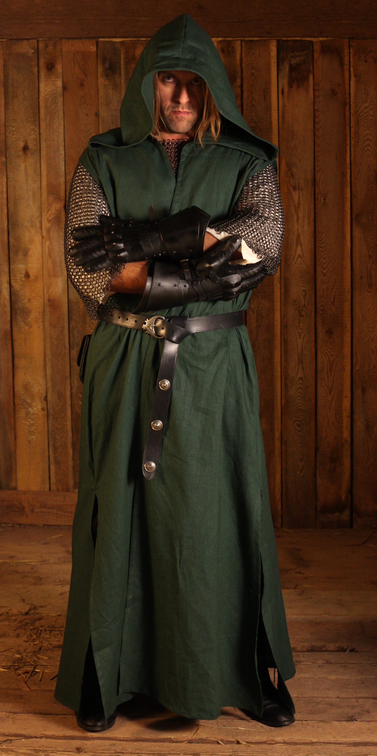 Lange grüne Weste mit Kapuze